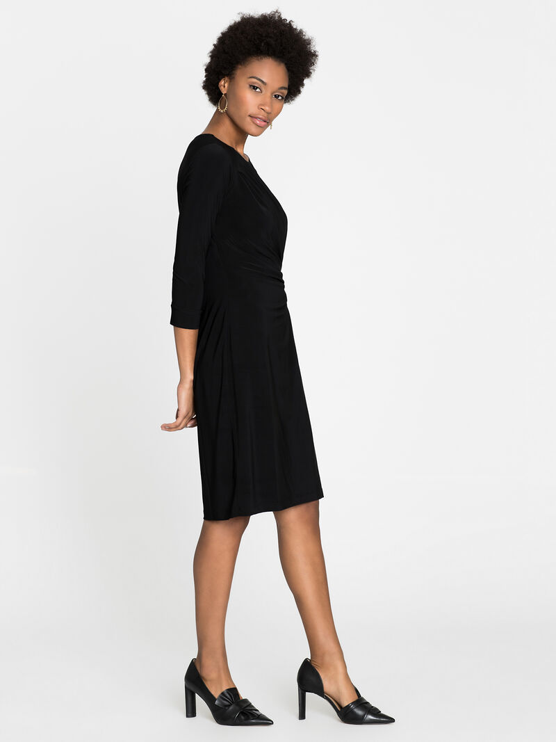 Woman Wears Sleeved Twist Dress image number 2
