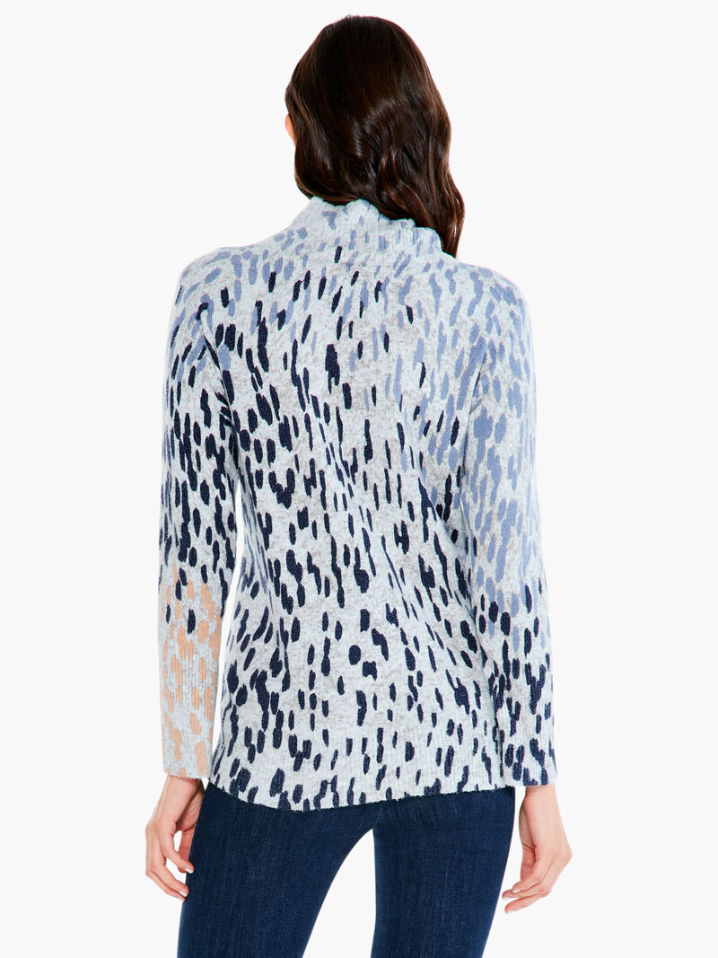 Woman Wears Cozy Up Spotted Turtleneck image number 2