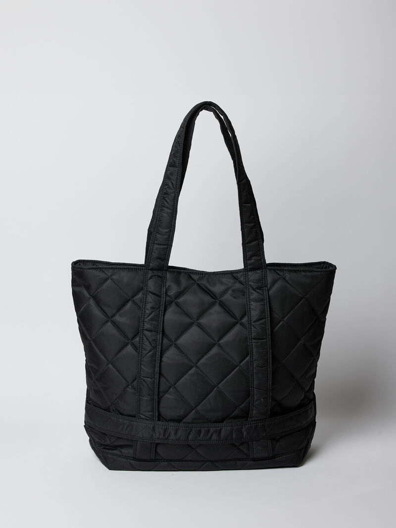 Woman Wears Hat Attack Original Fall Traveler Quilted Bag image number 1