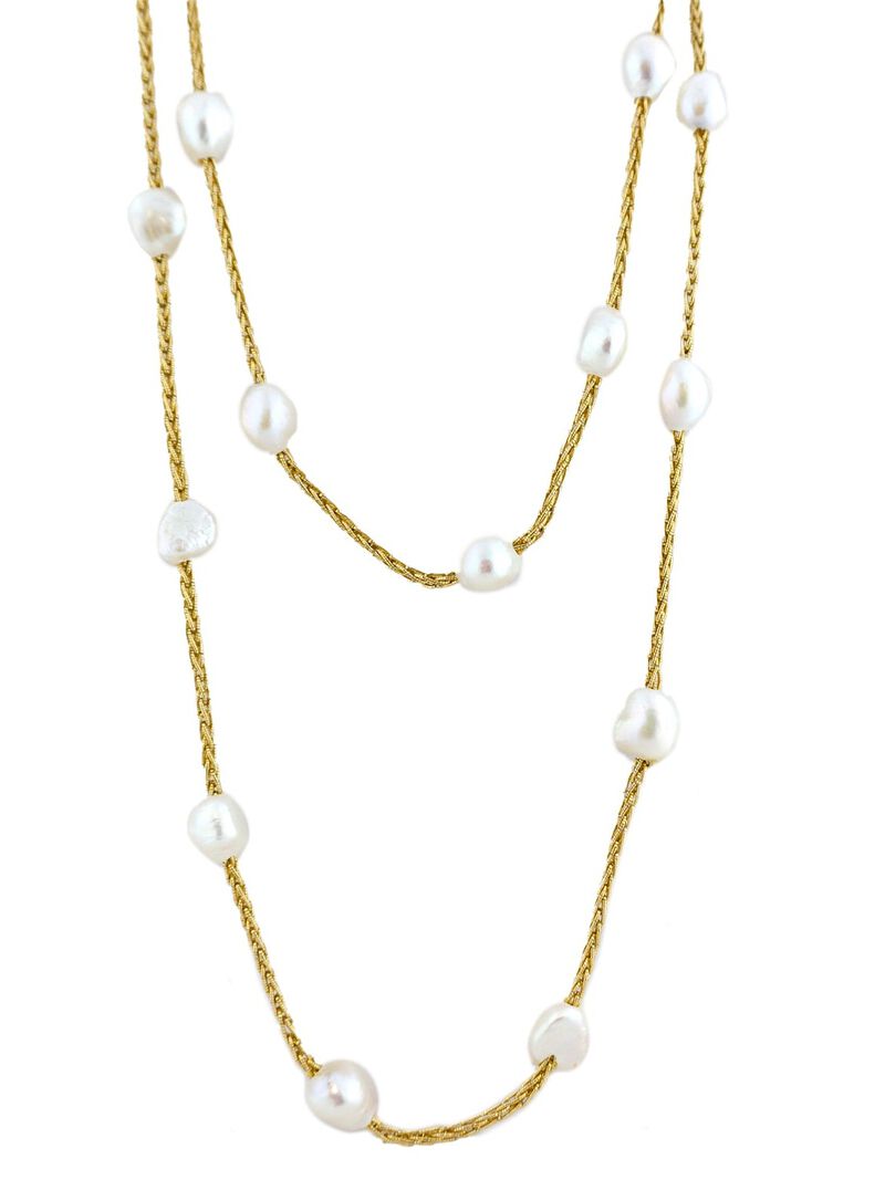 Woman Wears Marlyn Schiff Gold Plated Pearl Wrap Necklace image number 0