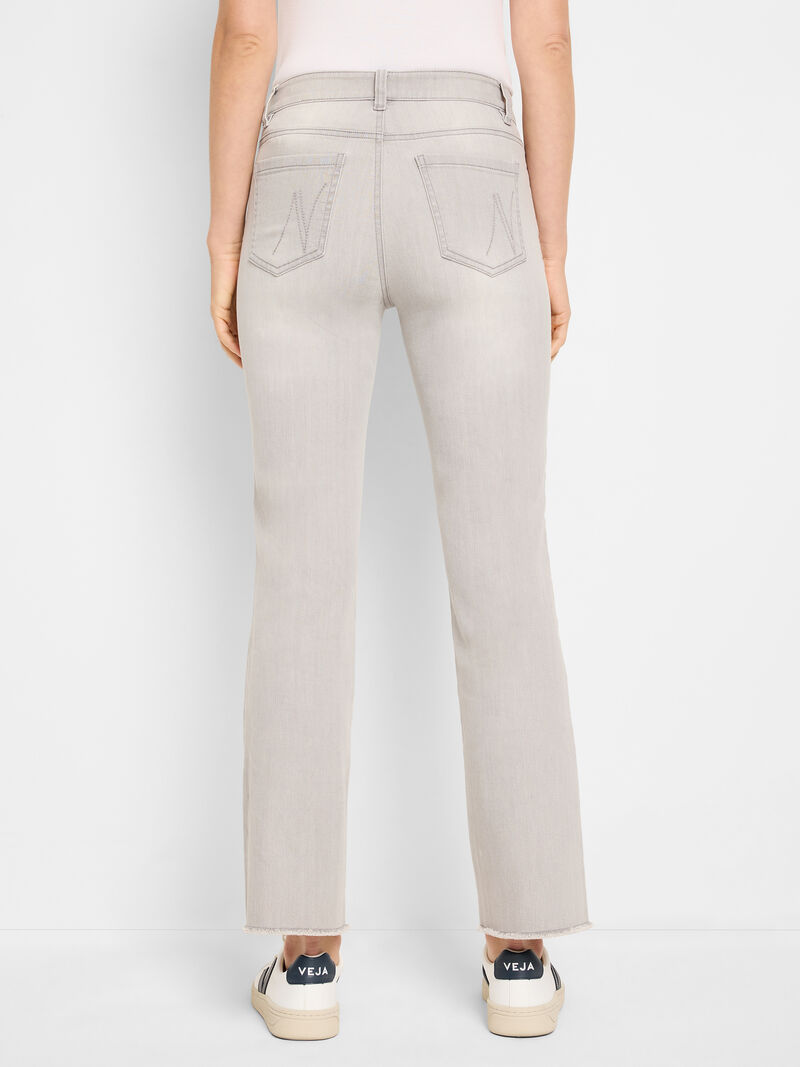 Woman Wears 28" Mid Rise Demi Boot Jeans image number 3