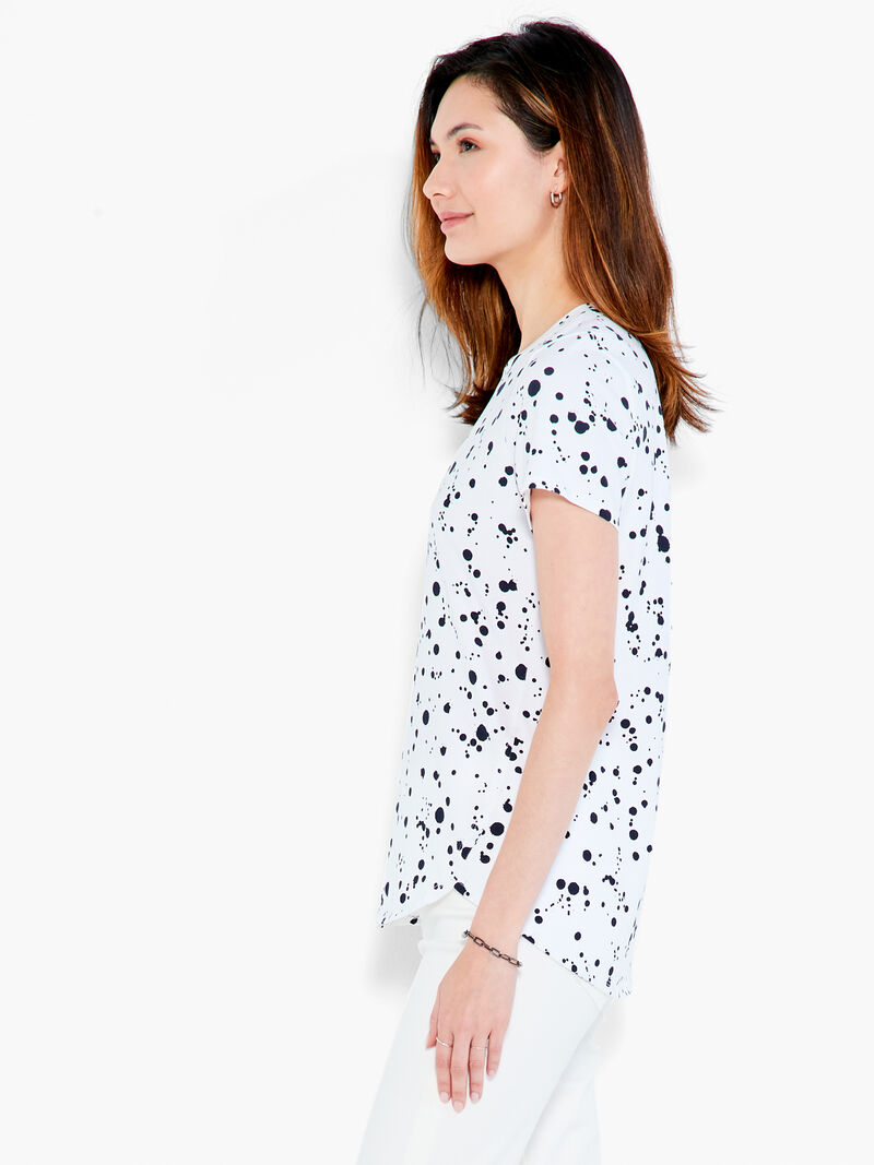 Woman Wears NZT Short Sleeve Splatter Shirt Tail Crew Tee image number 1