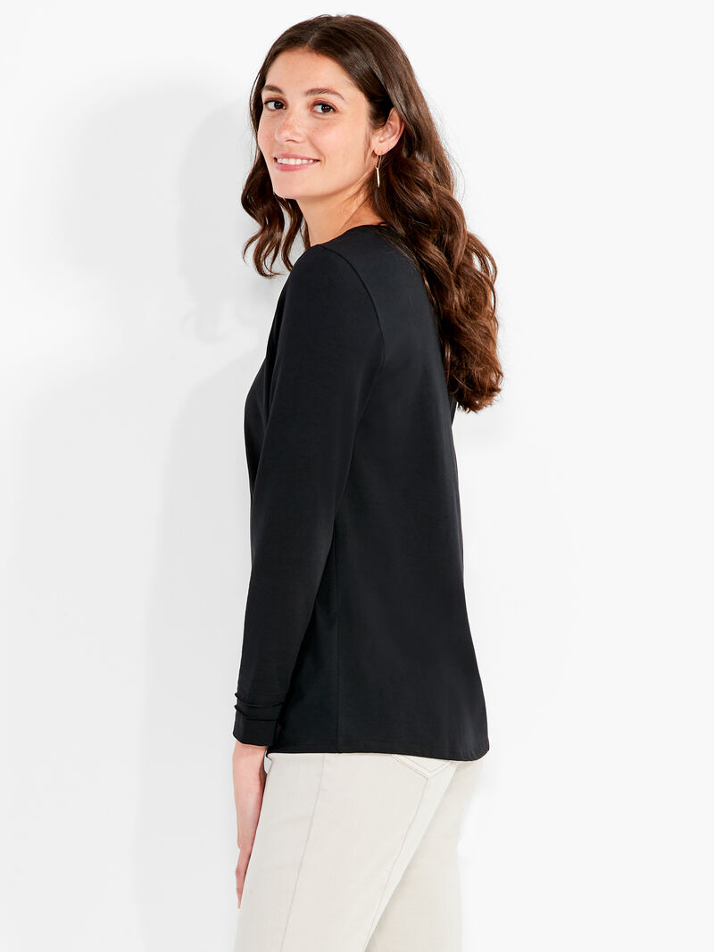 Woman Wears NZT Long Sleeve Crew Tee image number 1