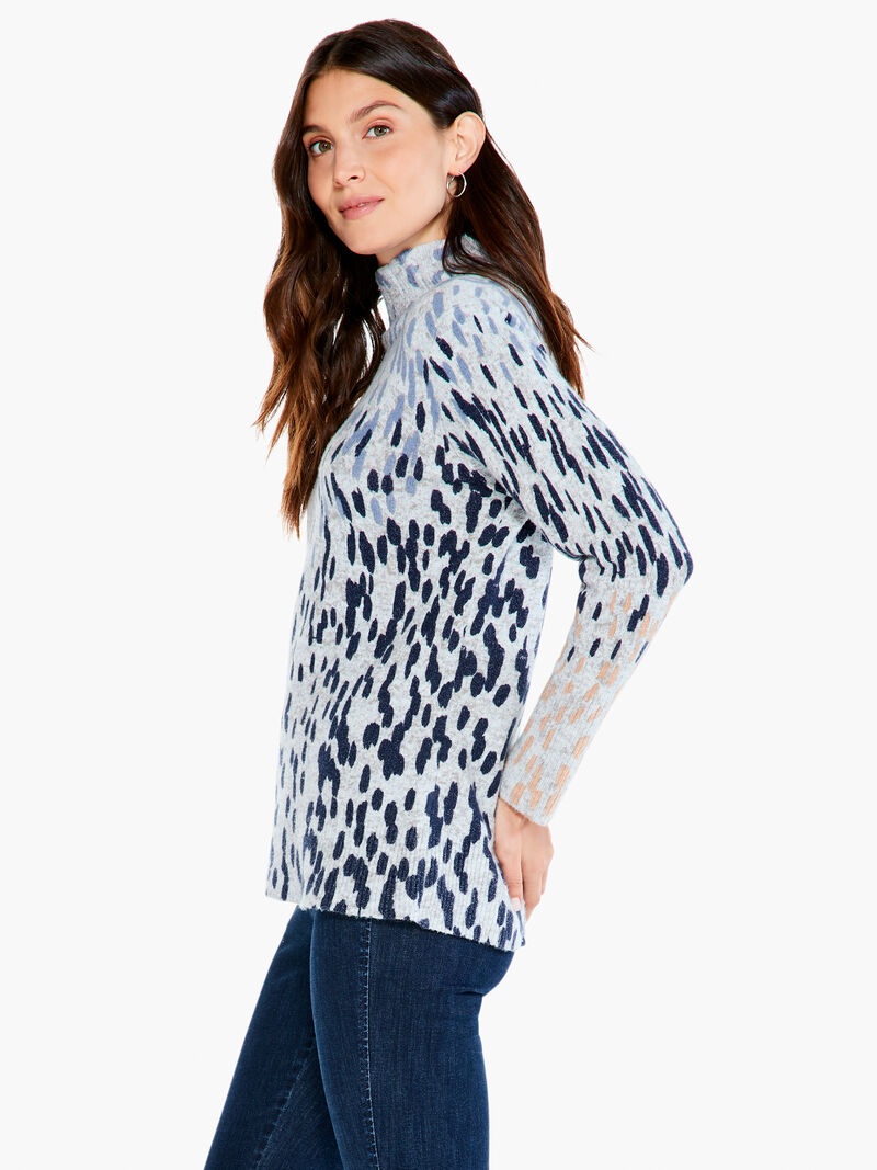 Woman Wears Cozy Up Spotted Turtleneck image number 1