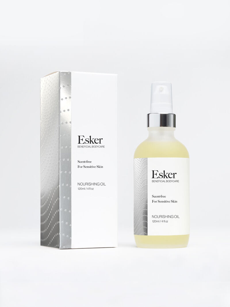 Woman Wears Esker - 2 Oz Unscented Body Oil image number 0
