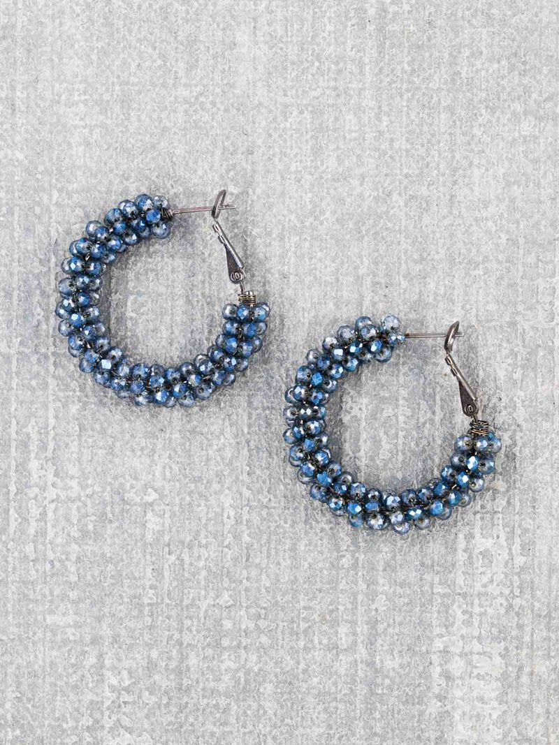 Woman Wears Marlyn Schiff Beaded Hoop Earring image number 0