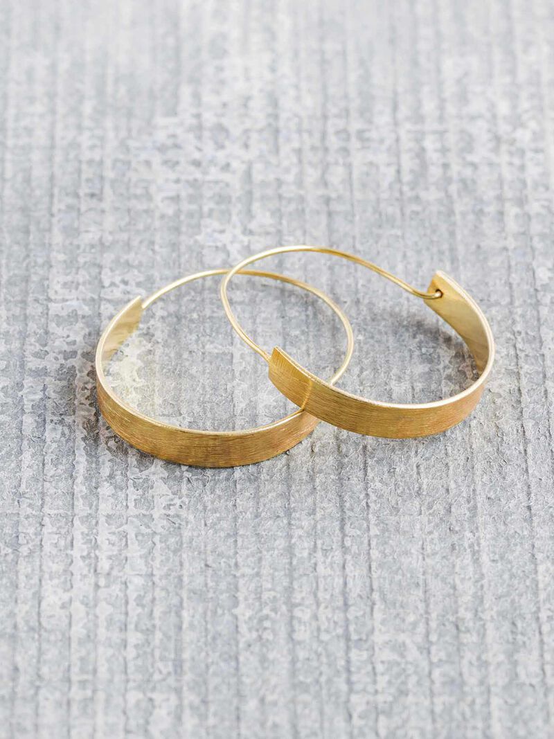 Woman Wears Baizaar  Brushed Brass Hoop Earring image number 0