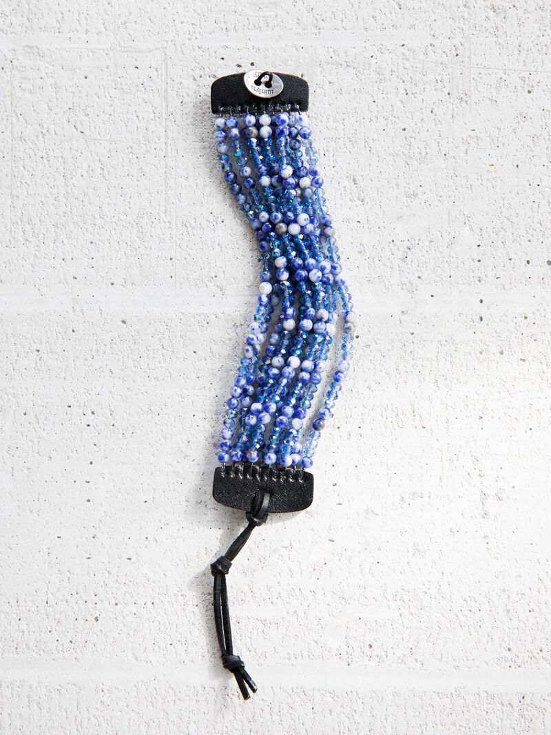 Woman Wears Marlyn Schiff Beaded Strand Bracelet image number 1