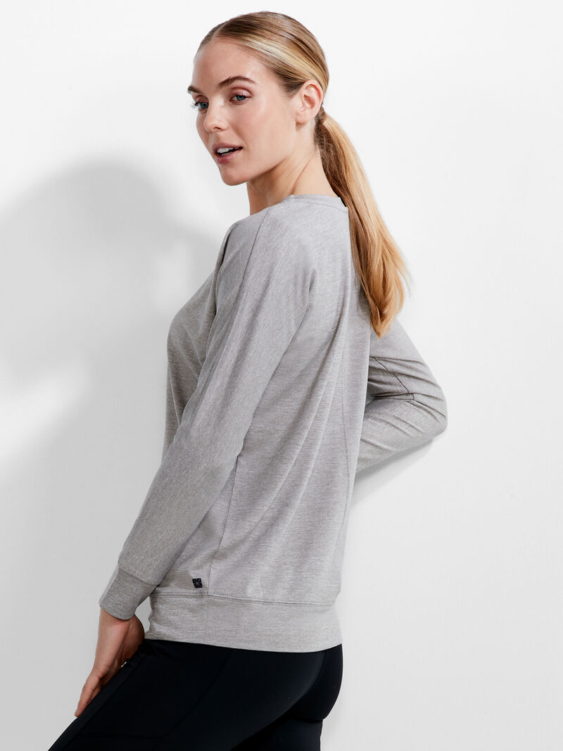 Woman Wears Flowfit Warm Up Top image number 1