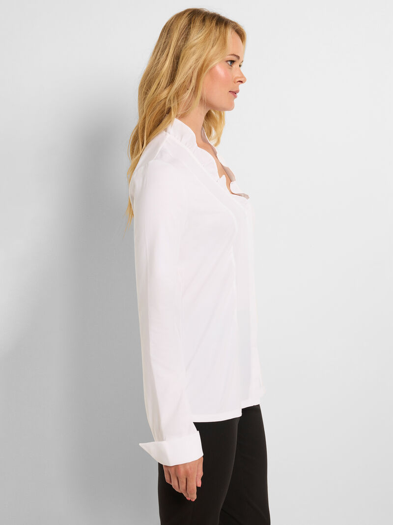Woman Wears Ruffled Around Shirt image number 2