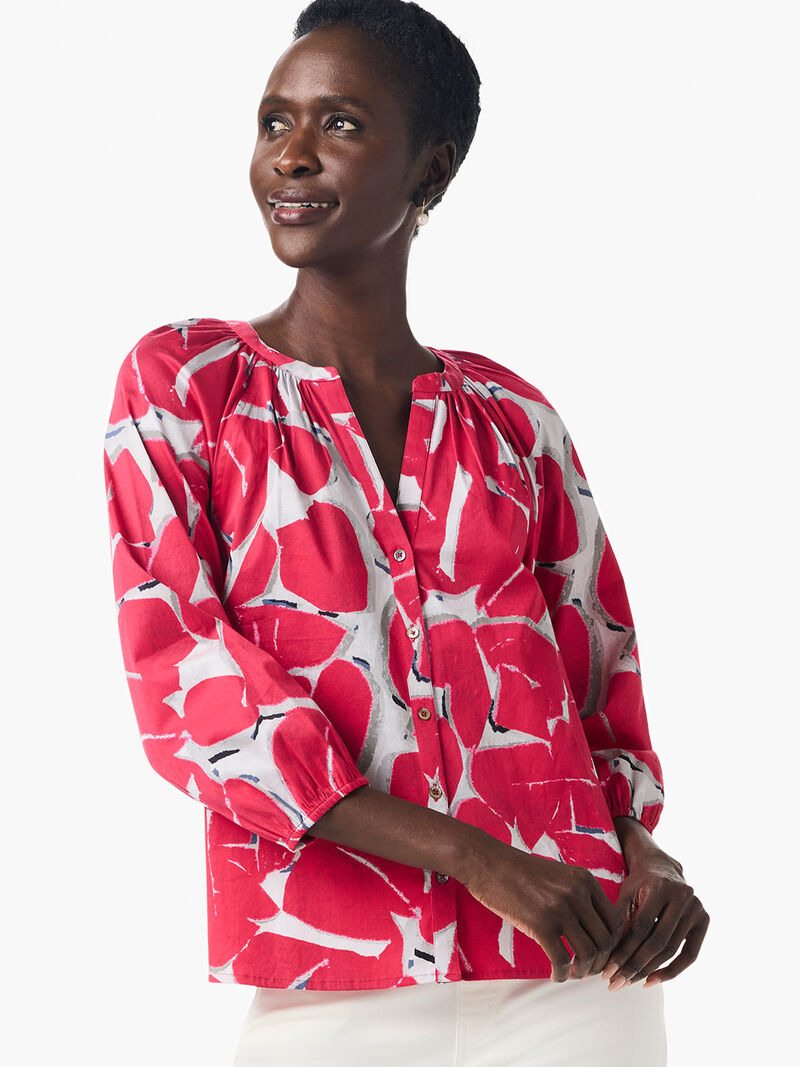 Woman Wears Bold Petals Shirt image number 0