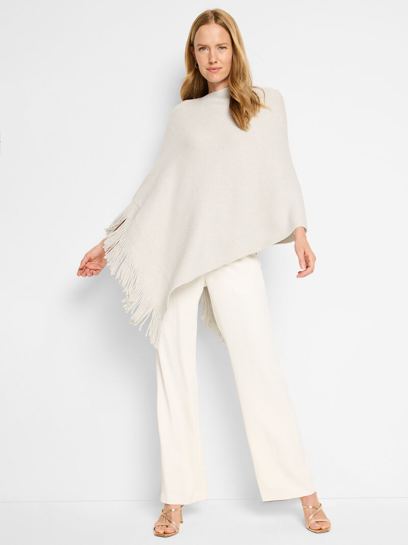 Woman Wears Metallic Go To Poncho image number 1