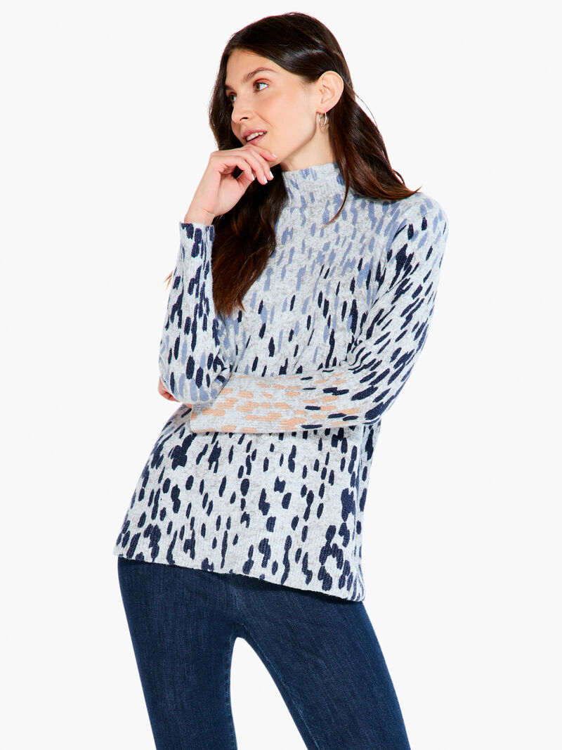 Woman Wears Cozy Up Spotted Turtleneck image number 0
