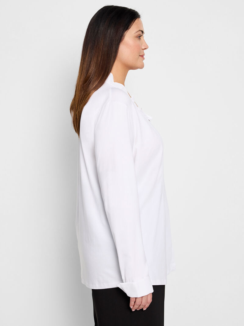 Woman Wears Ruffled Around Shirt image number 2