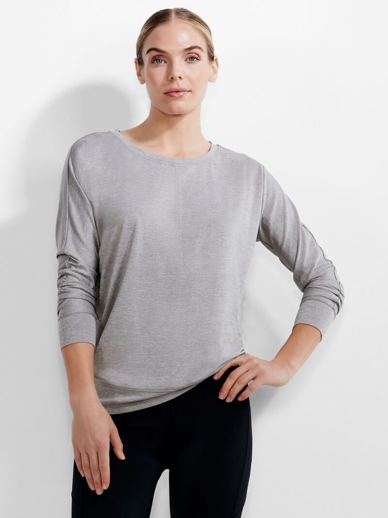 Woman Wears Flowfit Warm Up Top image number 0