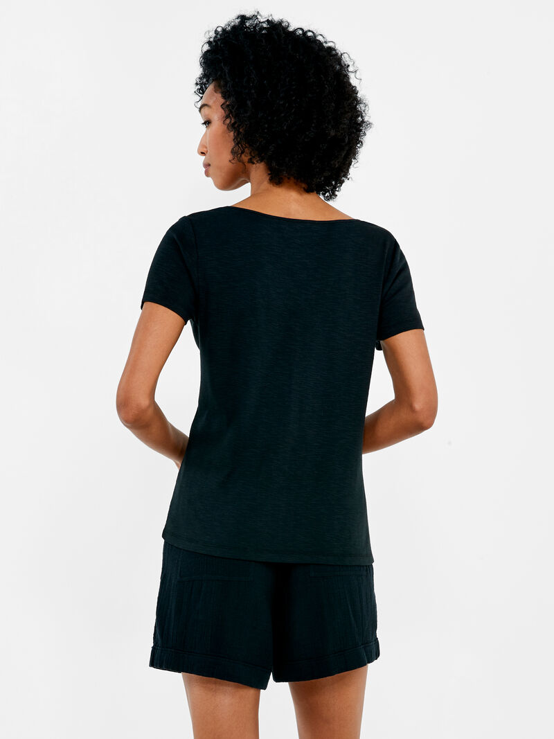 Woman Wears NZT Short Sleeve Knotted V-Neck Tee image number 2