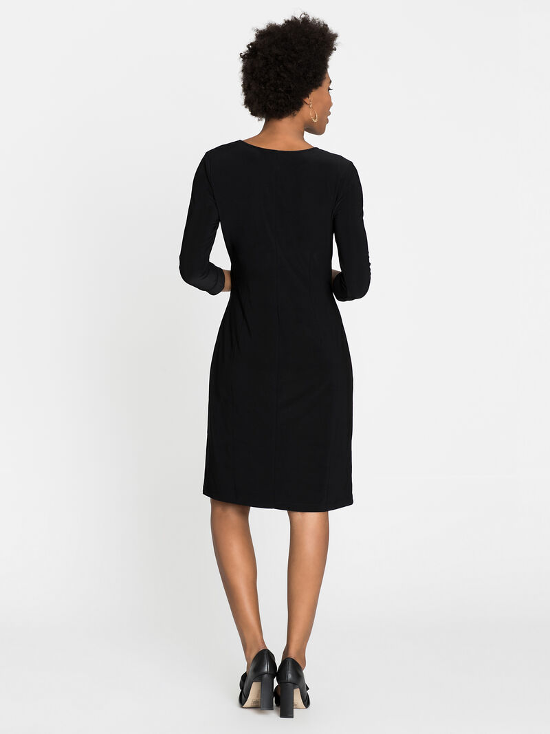 Woman Wears Sleeved Twist Dress image number 1