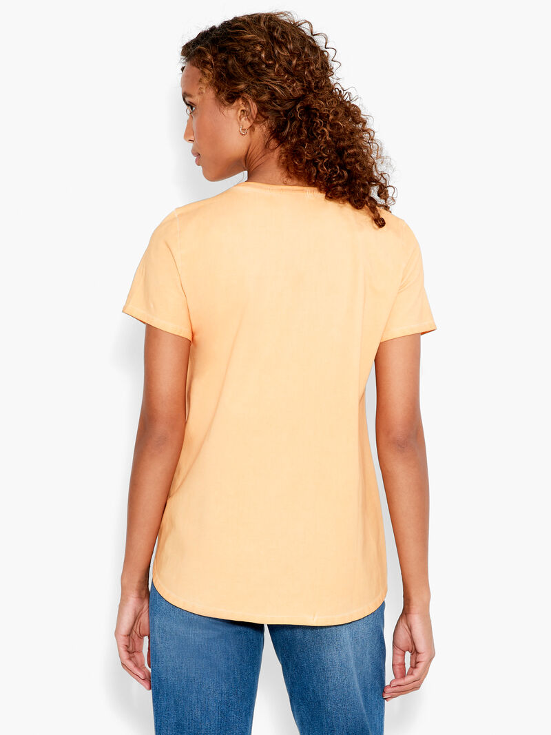 Woman Wears NZT Short Sleeve Shirt Tail Crew Neck Tee image number 2