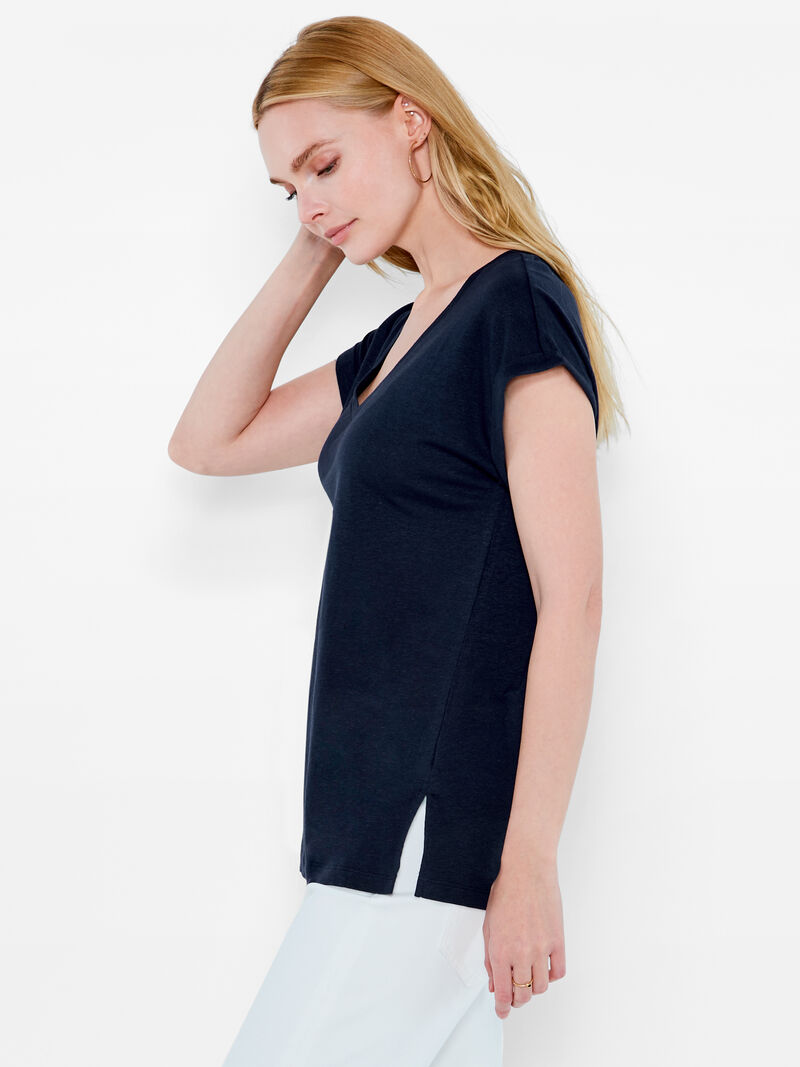Woman Wears NZT Short Sleeve V-Neck Tee image number 1