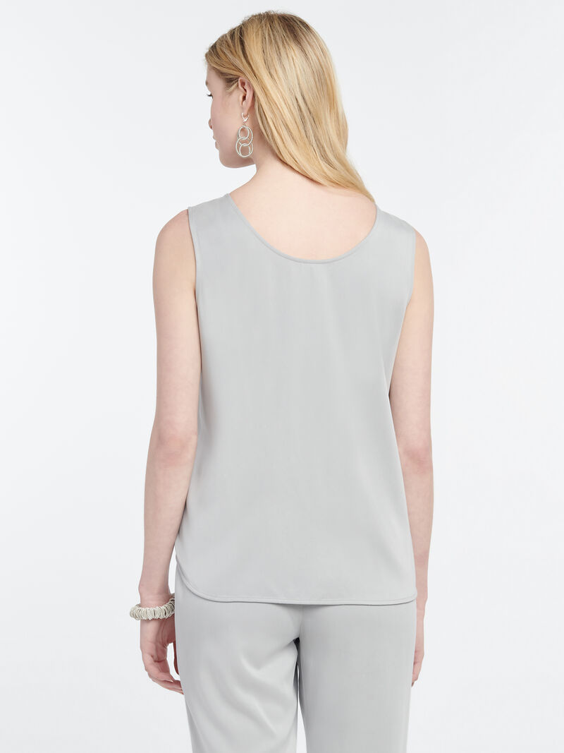 Woman Wears Sleek Tank image number 2