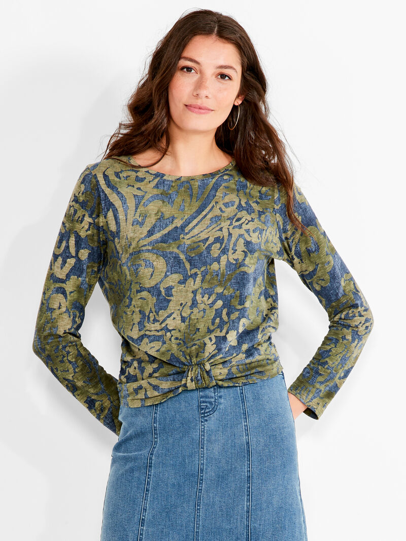 Woman Wears NZT Watercolor Camo Bracelet Sleeve Knot Front Tee image number 0
