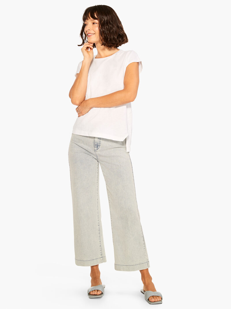 Woman Wears NZT Short Sleeve Crew Asymmetrical Tee image number 3
