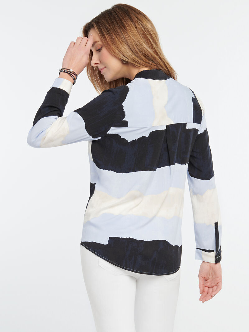 blue shirt with clouds