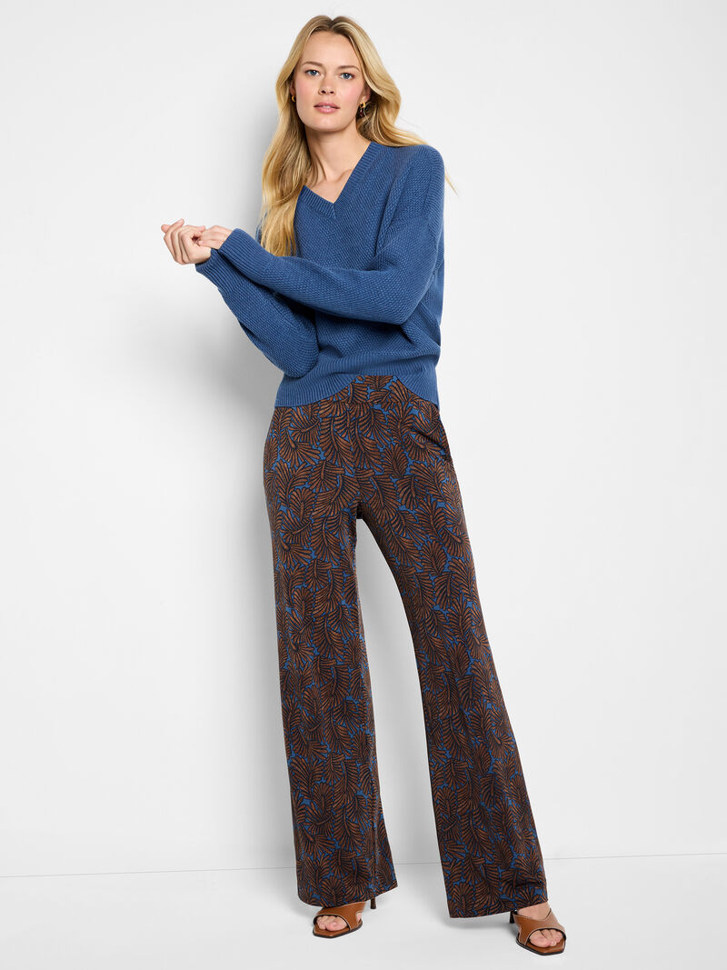 Woman Wears Tuck Stitch V-Neck Sweater image number 1