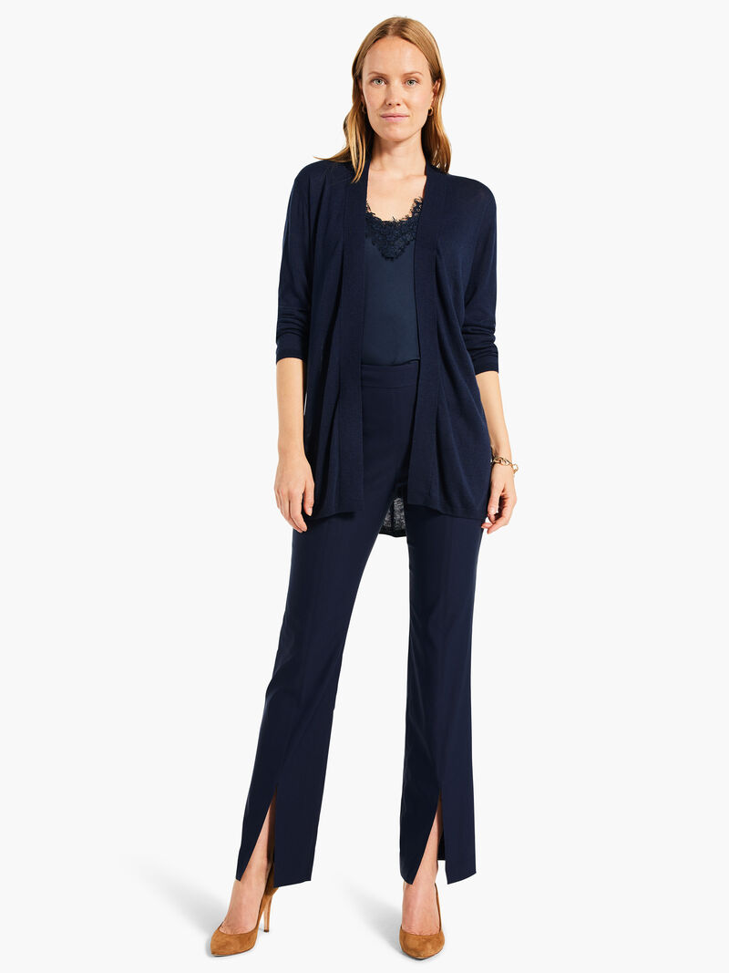 Woman Wears 31" Polished Wonderstretch Boot Cut Slit Pant image number 1