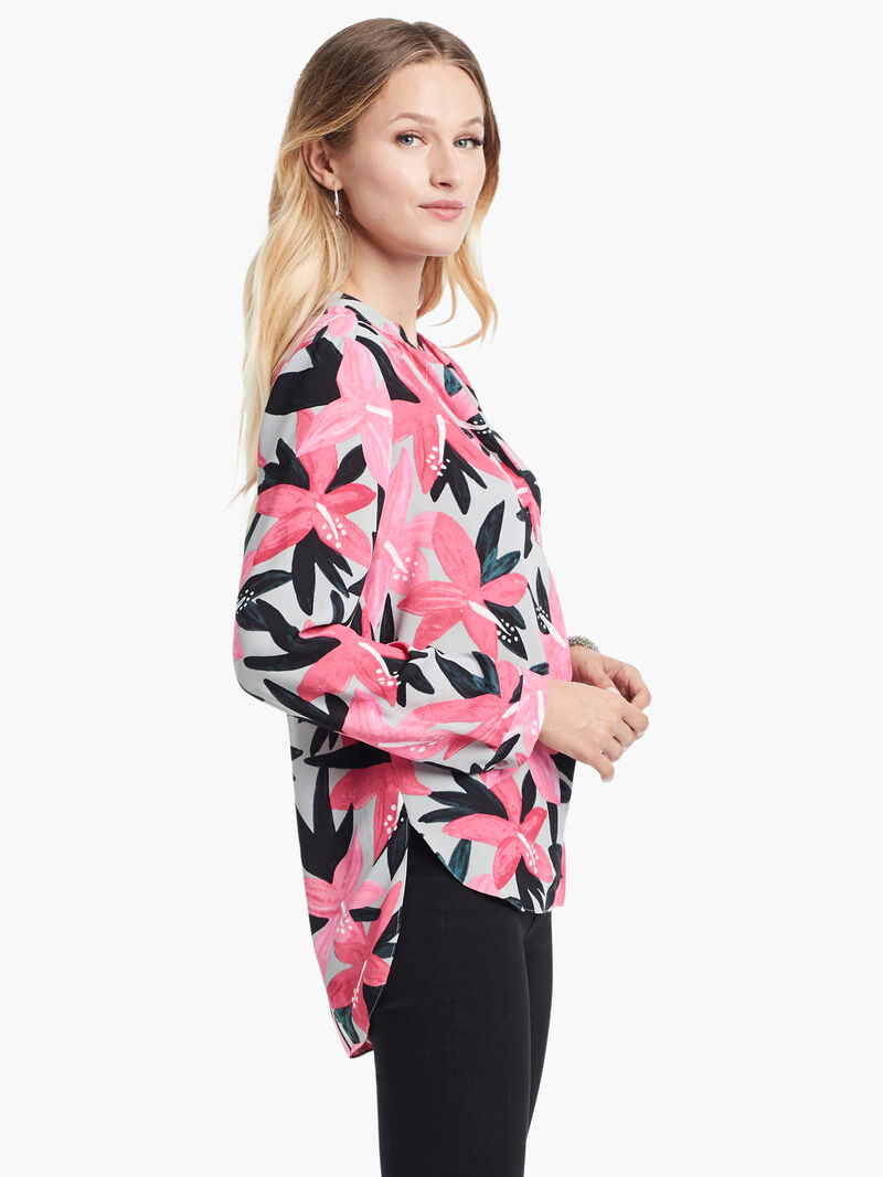 Woman Wears Poinsettia Blouse image number 1