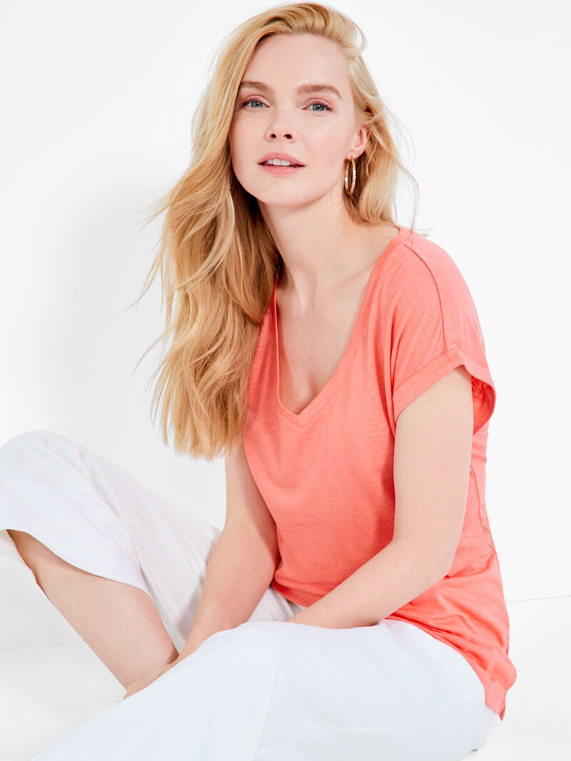 Woman Wears NZT Short Sleeve V Tee image number 0