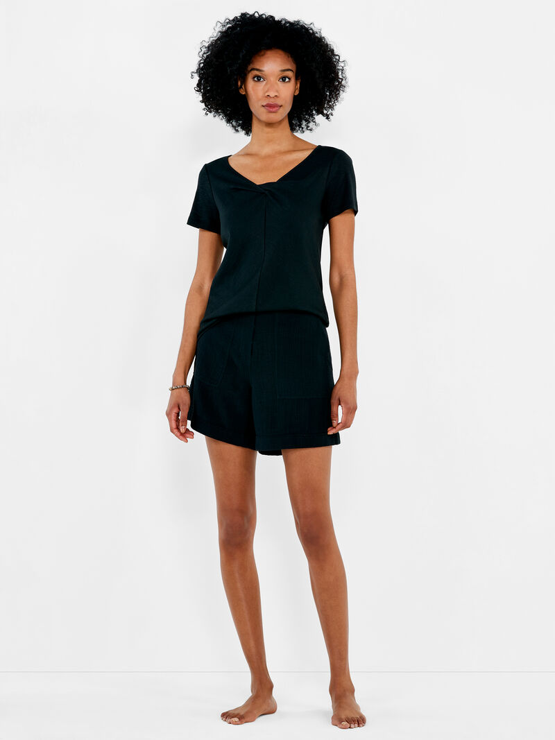 Woman Wears NZT Short Sleeve Knotted V-Neck Tee image number 3