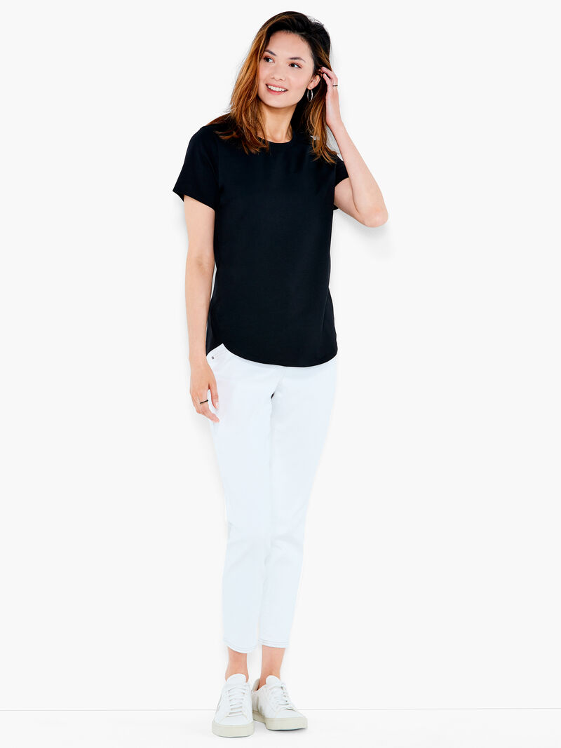 Woman Wears NZT Short Sleeve Shirt Tail Crew Neck Tee image number 3