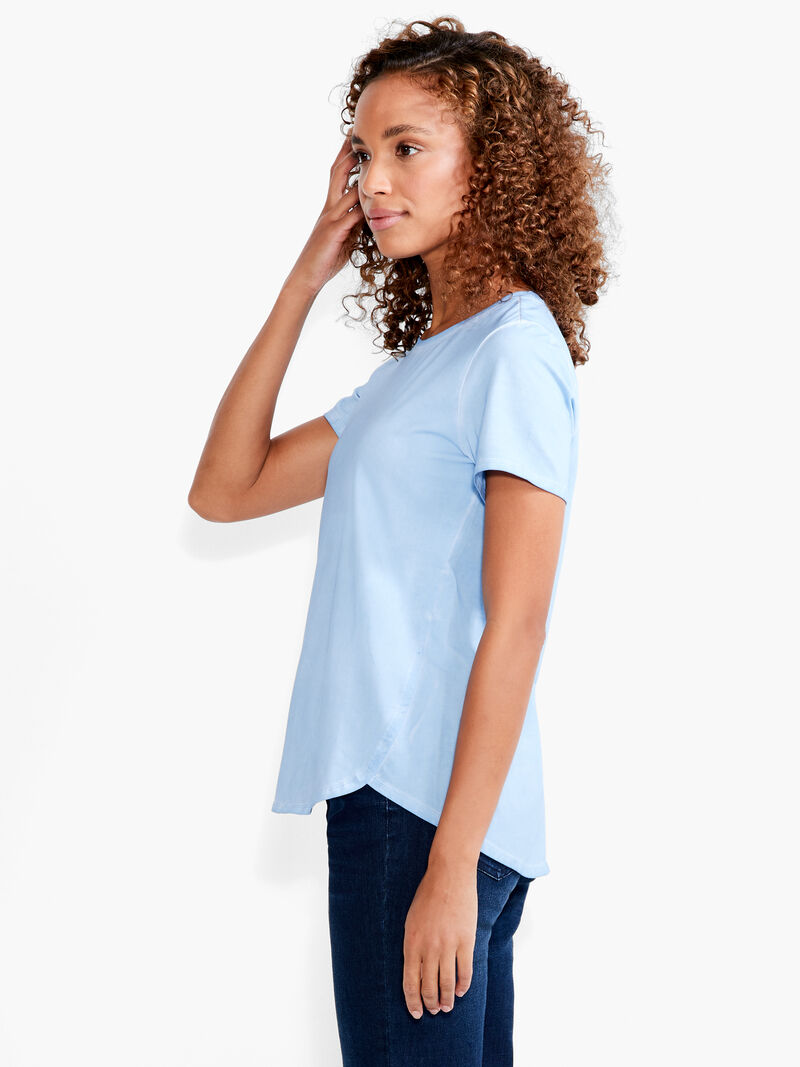 Woman Wears NZT Short Sleeve Shirt Tail Crew Neck Tee image number 1