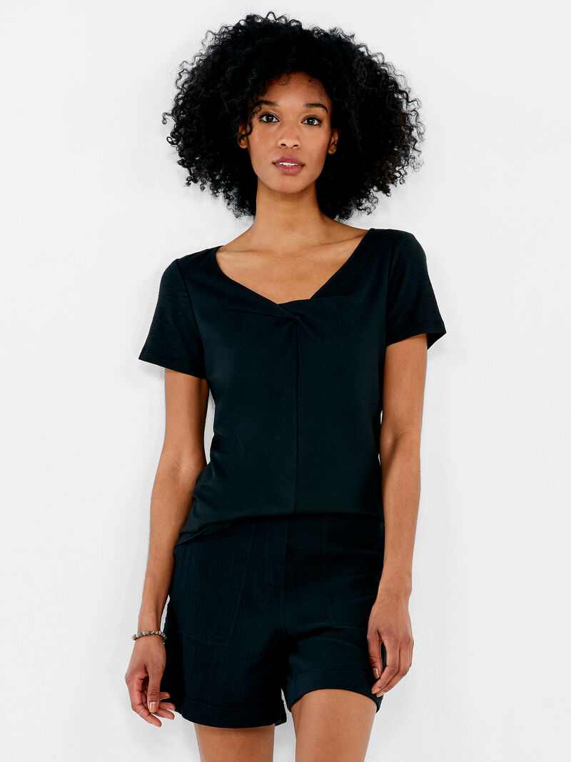 Woman Wears NZT Short Sleeve Knotted V-Neck Tee image number 0
