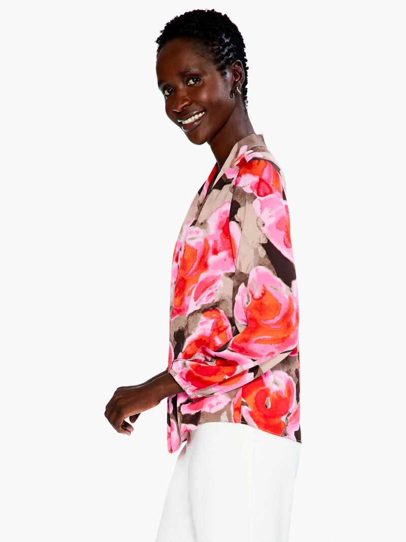 Woman Wears Rosy Outlook Top image number 1